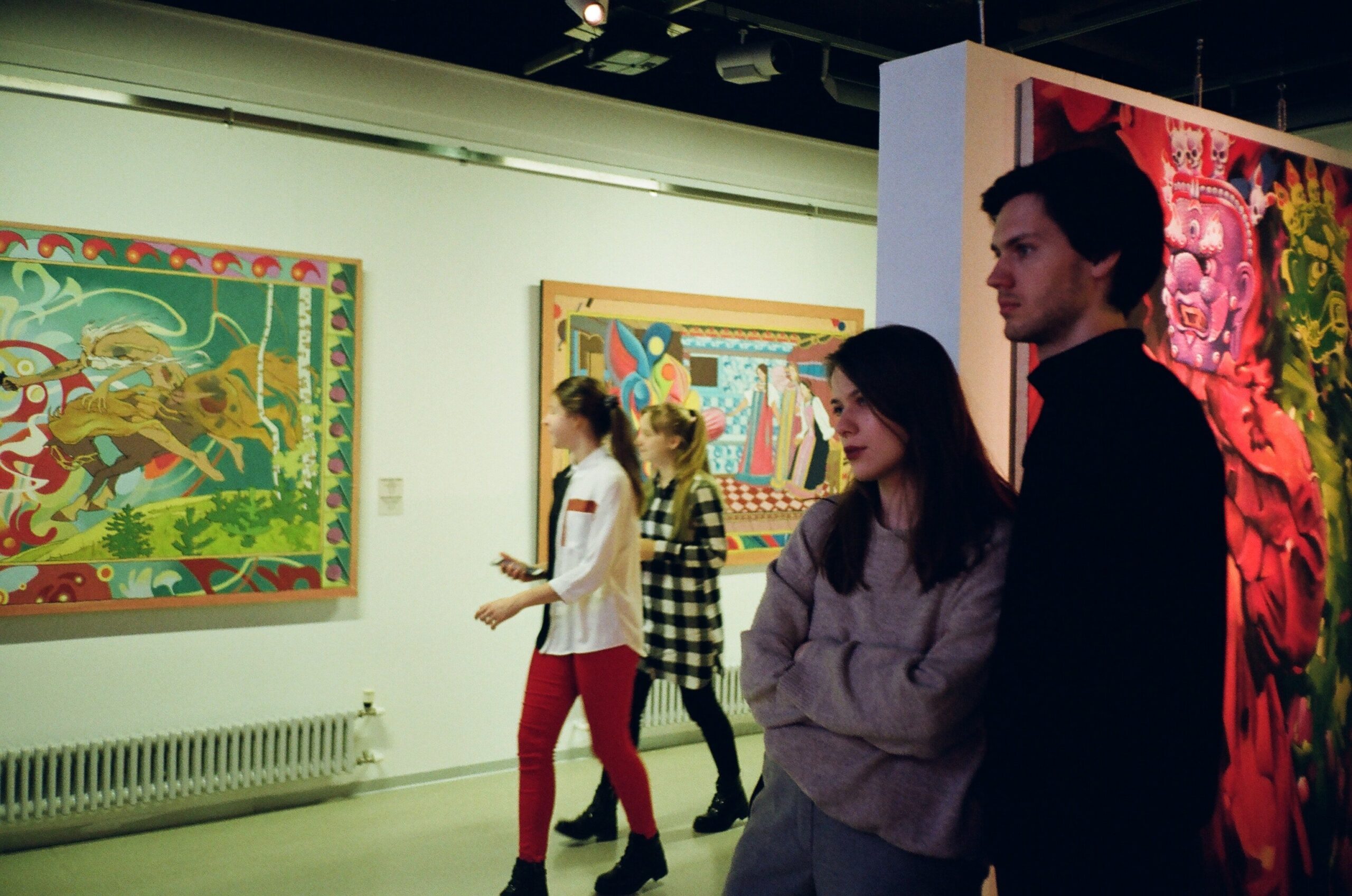 woman-leaning-on-man-standing-inside-room